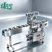 Machine de marquage laser automatique de haute précision avec module de positionnement rotatif à rouleaux pour la gravure laser sur bouteilles en verre rondes