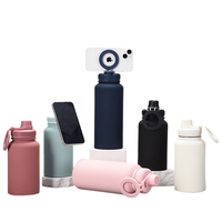 2024 couleur personnalisée 12oz enduit de poudre en acier inoxydable Thermos flacon aimant bouteille d'eau magnétique support pour téléphone portable cadeaux d'affaires