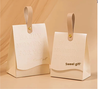 2024 nouvelles boîtes de bonbons de mariage emballage cadeau en carton spécial estampage manipulation vide sacs de bonbons de mariage fabricant direct