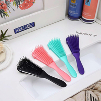 Brosse à cheveux en plastique ABS anti-statique à dents creuses, style pieuvre, avec logo personnalisé, pour salon et usage domestique, vente directe usine