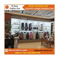 Présentoir de meubles personnalisable pour clubs de golf Bâtons de hockey muraux et sacs de queue pour centre commercial