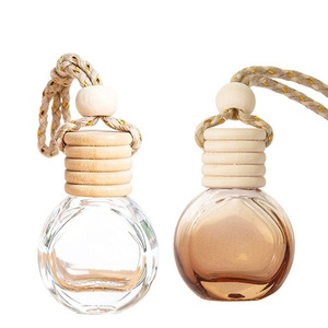 Diffuseur de parfum pour voiture en verre vide de 8 ml, nouveau design, forme plate et ronde, avec couvercle en bois - Product Image 1