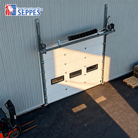 Porte sectionnelle industrielle automatique SEPPES, porte à levage vertical, porte en panneaux sandwich isolés