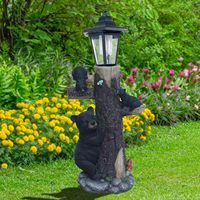 Sculpture d'ours noir en résine solaire personnalisée en usine Ornement de cour Décoration de jardin Statue extérieure légère