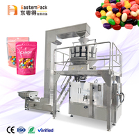 Machine de remplissage et de scellage rotative pour sachets préformés avec sacs en papier pour bonbons enrobés de chocolat et produits de confiserie
