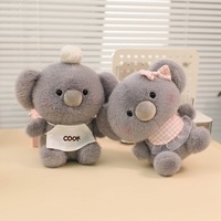 Joli lapin en peluche kawaii avec tablier blanc, oreilles tombantes et yeux noirs, idéal pour les fêtes et la décoration intérieure