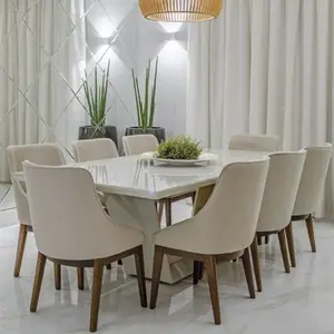 8人餐桌椅包括一个长方形的厨房白色饰面桌子和八个浅米色织物的牧师椅子