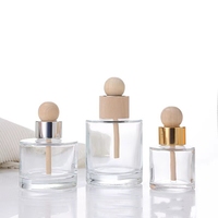 Vente en gros 60ml/100ml/150ml plat fleurs séchées sans feu aromathérapie couvercle en bois bouteilles vides en verre pour voiture et usage domestique