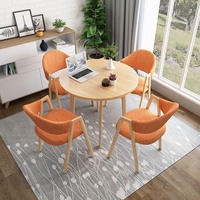 Ensemble table et chaises de salle à manger 4 places style nordique de luxe pour bureaux commerciaux, salons de thé, maisons et petits appartements - Design moderne et minimaliste
