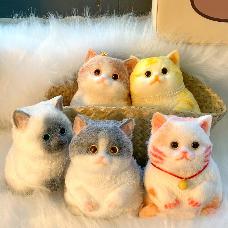 Мягкие игрушки-кошки