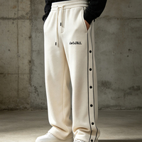 Pantalon de survêtement à fermeture latérale LTD-MTR1051 avec passepoil contrastant, patte de boutonnage, taille à cordon de serrage, ourlet ouvert, en molleton – Service de fabrication OEM