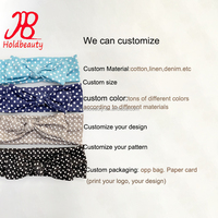 Casque de bébé à pois à imprimé floral en tissu doux et extensible de haute qualité