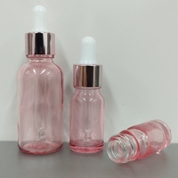 Bouteilles d'huiles essentielles personnalisables de haute qualité 5ml-100ml, flacon compte-gouttes en verre rose à col, prix bas, fabricant professionnel