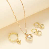 Ensemble de bijoux pour femmes, 4 pièces, plaqué or, style punk simple, collier, bagues, boucles d'oreilles, ensemble de bijoux en forme de cœur