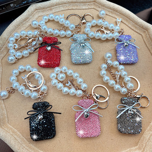 Crystal Rhinestone Perfume Bottle Keychain Pendant Pearl Bow Key Chain Bling Diamond Bag Car Hanging Jewelry Charms Womens Gifts