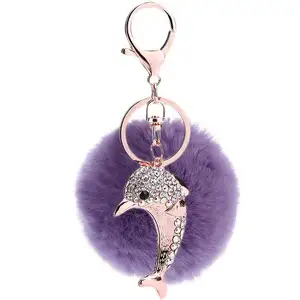 Porte-clés boule de fourrure peluche violet pompon style dauphin 7cm