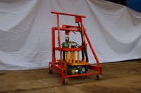 Machine à fabriquer des blocs de ciment creux QTM2-45, petite, manuelle, au prix le plus bas, machine à fabriquer des briques autobloquantes