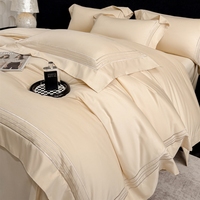 Nouvel ensemble de literie 4 pièces en coton satiné à longues fibres, style luxe, housse de couette confortable pour la chambre à coucher