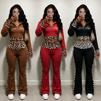 Ensemble deux pièces sportswear extensible pour femme, style européen et américain, avec sweat à capuche court zippé à imprimé léopard et pantalon évasé taille haute