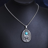Nouveau collier pendentif rond en acier inoxydable style européen rétro, motif aigle turquoise, tendance hip-hop