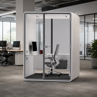 Cabine de bureau modulaire, acoustique, mobile, insonorisée, pour réunions et appels téléphoniques, offrant une intimité partagée