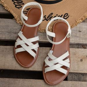 Sandales plates romaines unies pour femmes, respirantes, avec bande élastique et brides croisées, idéales pour la plage et l'extérieur en été - Product Image 5