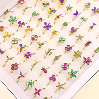 Boîte de 100 bagues pour femmes en acier inoxydable plaqué or, tendance, avec motif papillon et taille ajustable