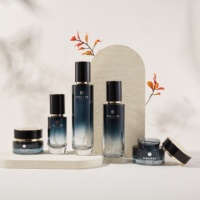 Pack 30g 50g 40ml 100ml 120ml Magnifiques flacons et pots cosmétiques noirs uniques Ensemble de flacons de lotion pour le soin du visage