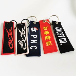 Wholesale Customized Remove Luggage Tag <b>Label</b> Before Embroidery Keyring Flight for logo Woven Keychains - Product Image 4