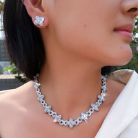 Parure de bijoux Hip Hop en saphir bleu, collier et boucles d'oreilles trèfle à quatre feuilles, chaîne cubaine en zircon cubique pour femme et homme