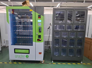 Distributeur automatique double usage pour snacks et produits intimes avec système de paiement par pièces, incluant des fonctions café et ascenseur - Product Image 2
