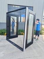 Double porte avec verre en fer forgé et peint en noir