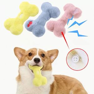 ของเล่นสุนัขตุ๊กตาสไตล์การ์ตูนสุดฮิต รูปทรงกระดูก ทนทานต่อการกัด ซักล้างได้ มีเสียงสนุก ไม่ทำให้เมื่อยล้าสำหรับสัตว์เลี้ยง - Product Image 1