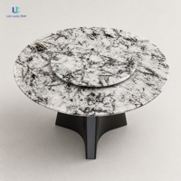 Table à manger ronde en marbre Luca Patagonia avec plateau tournant |   Colonne cannelée en marbre veiné noir poli, sur mesure pour villa et hôtel