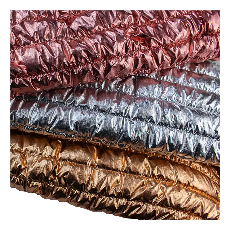 Tecido bronzeado especial horizontal bordado acolchoado tecido elástico bordado tecido para processamento de algodão tecido bordado