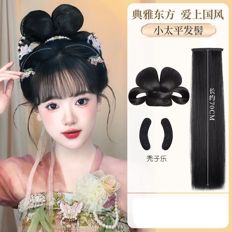 กิ๊บติดผมคู่ของชายหัวล้านเล็กๆ ที่ไท่ผิง