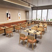 Tables et chaises de restaurant populaires utilisées dans les cafés modernes, les salons de thé et les bars des cybercafés