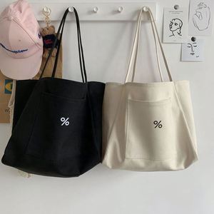 Large Capacity Durable Eco-Friendly Canvas Student Shopping <b>Bag</b> with Custom Logo <b>Hand</b> <b>Carrying</b> Single Shoulder <b>Bag</b> - Product Image 4