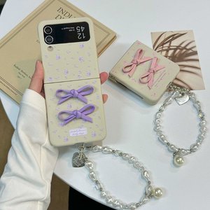 <span class=keywords><strong>Coque</strong></span> de téléphone Ins Style Girl <span class=keywords><strong>avec</strong></span> sangle en <span class=keywords><strong>chaîne</strong></span> pour <span class=keywords><strong>Samsung</strong></span> Z Flip 3 4 5 6 Bowknot Flower Phone Case - Product Image 1