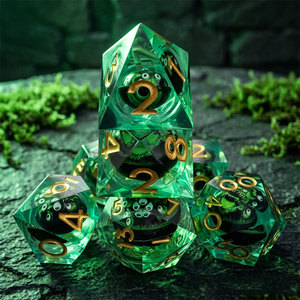 Juego de dados de resina de 7 piezas con borde afilado, núcleo líquido esmeralda, ojos de monstruo Cthulhu multiojos y números dorados para juegos de rol de mesa DnD - Product Image 1