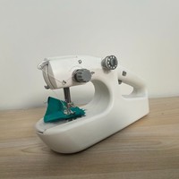 Mini machine à coudre portable électrique pour travaux d'aiguille et vêtements, vente en gros