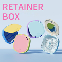 Boîte à appareil dentaire portable en plastique ABS avec miroir et drain, logo personnalisé