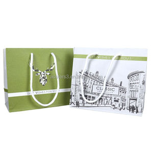 Sacs cadeaux personnalisés de luxe en papier recyclé avec poignée en ruban, logo en relief, impression, revêtement UV, dorure à chaud, marque XTY, Guangdong - Product Image 3
