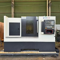 Torno CNC de bancada inclinada ShanDong HR TCK50 con contrapunto programable y sistema GSK para alta precisión