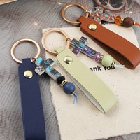 Porte-clés minimaliste, porte-clés en cuir croisé tendance, porte-clés en cuir PU pour femmes