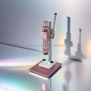 Machine de sertissage et de capsulage pour flacons de parfum, y compris les flacons pulvérisateurs et les capuchons de pompe, avec fonction de pressage des anneaux de col intermédiaire - Product Image 2