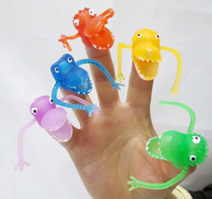 Marioneta de dedo de dinosaurio de PVC creativa, Mini funda para dedo, Gacha, juguetes interactivos para niños pequeños