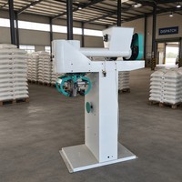 Balance d'emballage industrielle monoposte pour l'industrie de la mouture de la farine, avec pesage, couture et convoyage en une seule opération
