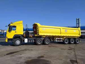 Semi-remorque benne basculante robuste en acier jaune 6x4 Diesel 12R22.5 pour transport d'engins - Product Image 1