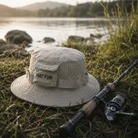 Topi ember safari anti air nilon berkualitas tinggi dengan ventilasi, bordir logo custom, dan tali yang dapat dilepas